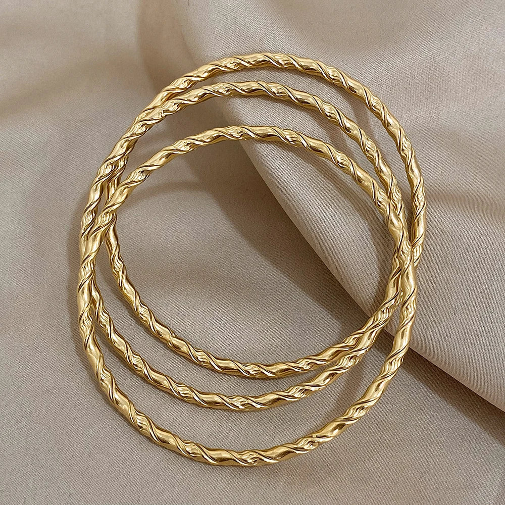Safiya – Lot 3 Bracelets Dorés Torsadés Acier Inoxydable Waterproof | FancyFez
