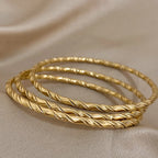 Safiya – Lot 3 Bracelets Dorés Torsadés Acier Inoxydable Waterproof | FancyFez