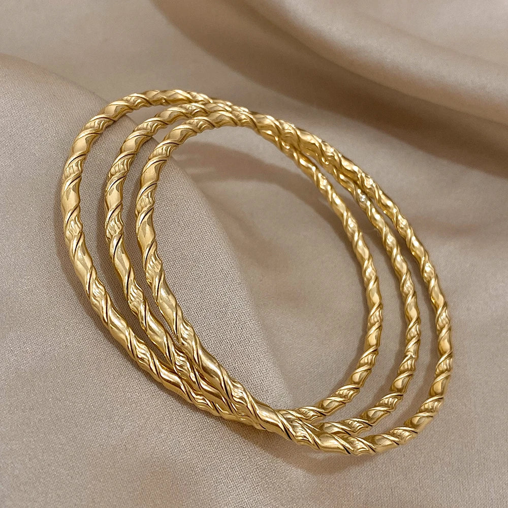 Safiya – Lot 3 Bracelets Dorés Torsadés Acier Inoxydable Waterproof | FancyFez