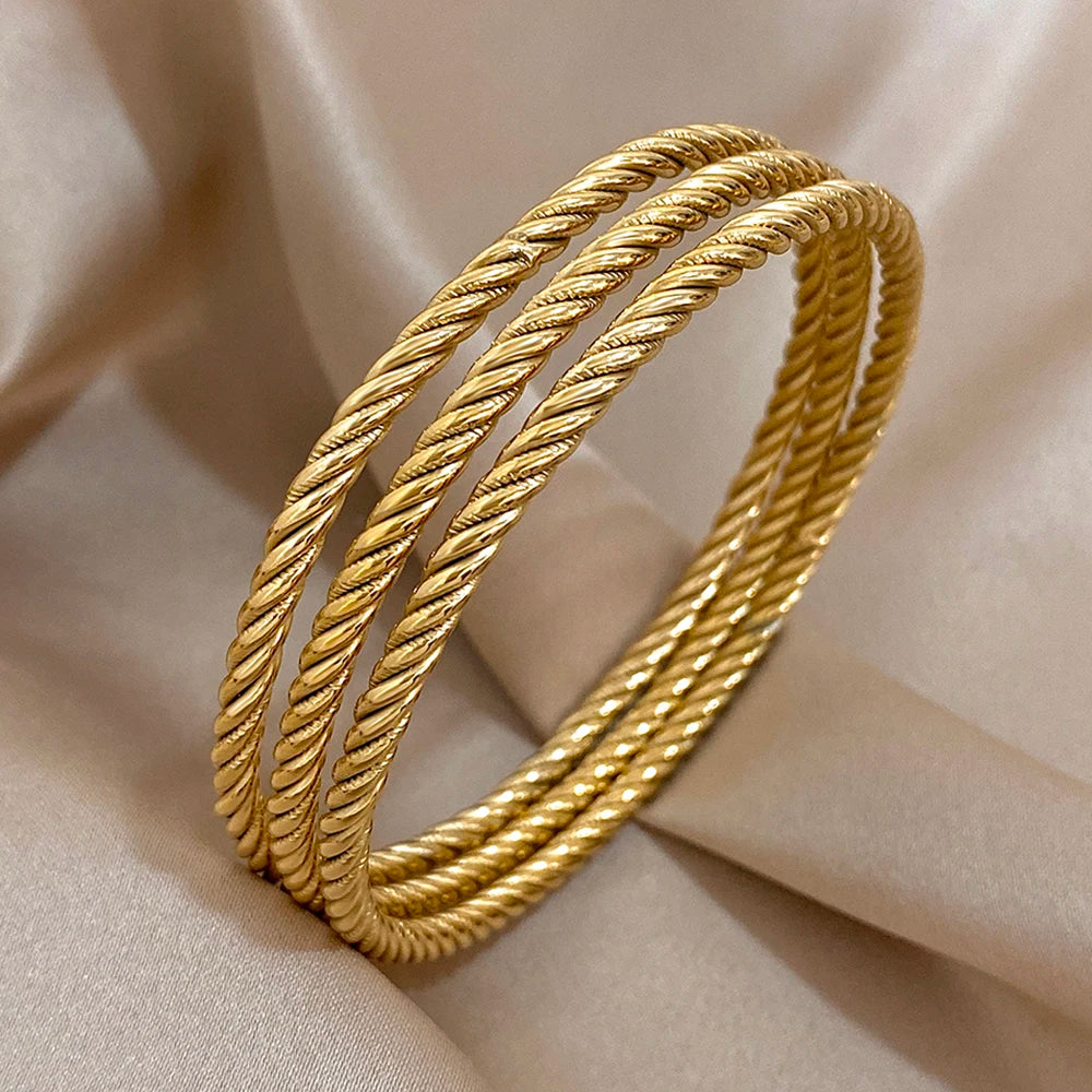 Safiya – Lot 3 Bracelets Dorés Torsadés Acier Inoxydable Waterproof | FancyFez